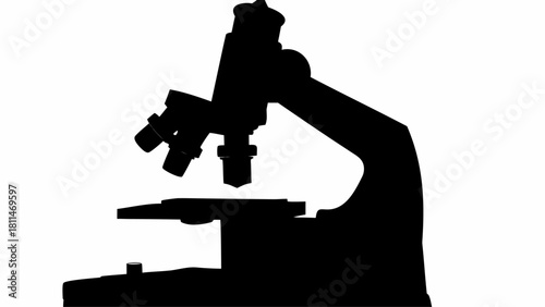 Silhouette depiction of a microscope with objective lenses and a stage for sample viewing