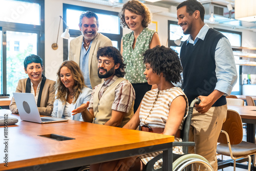 Tableau sur toile Diverse corporate team collaborating in inclusive coworking office