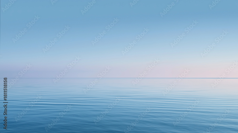 Fototapeta premium A tranquil minimalist ocean line under soft pale-blue sky.
