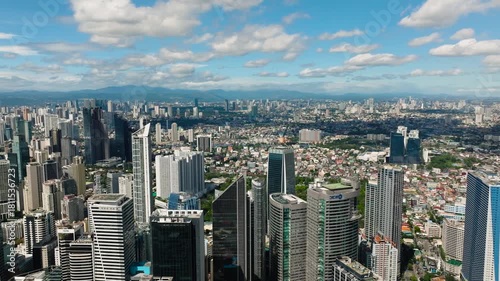 Expansive view of urban sprawl, highlighting residential areas and highway systems. Metro Manila, Philippines.