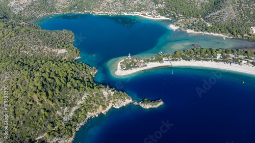 Fototapeta Naklejka Na Ścianę i Meble -  Summer destination drone view showing Ölüdeniz’s bright blue sea and natural bay.