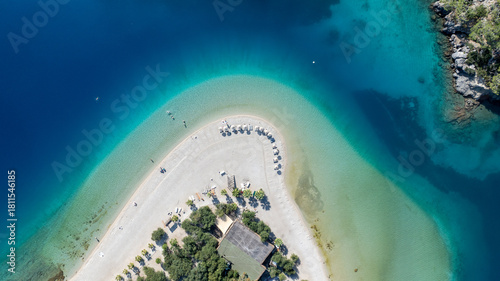 Fototapeta Naklejka Na Ścianę i Meble -  Aerial summer travel scene showing Ölüdeniz Blue Lagoon’s vivid turquoise sea