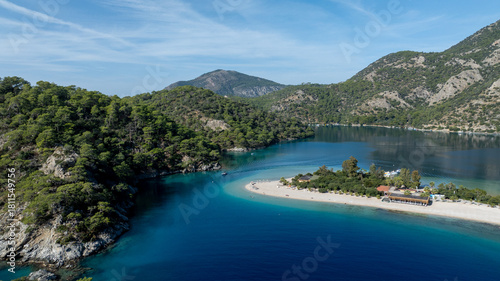Fototapeta Naklejka Na Ścianę i Meble -  High-angle summer view of Ölüdeniz with its curved beach and crystal-clear waters.