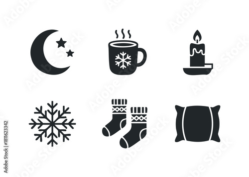 Black silhouette icons representing winter comfort and cozy night essentials like a moon, stars, steaming mug, candle, snowflake, warm socks, and soft pillow for seasonal graphics