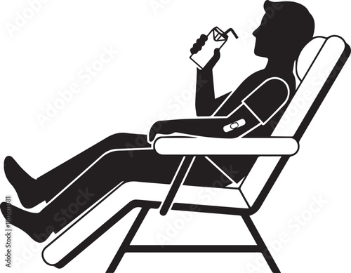 Relaxed man silhouette sitting in deck chair enjoying a refreshing drink