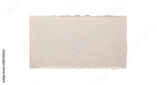 A beige rectangular piece of paper with a slightly torn or rough edge on a black background
