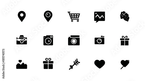 Modern black glyph icons pack including map pins, shopping cart, cameras, gift boxes, and love hearts for web and app design.