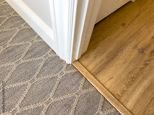 Trim detail on carpet and laminate floor transition