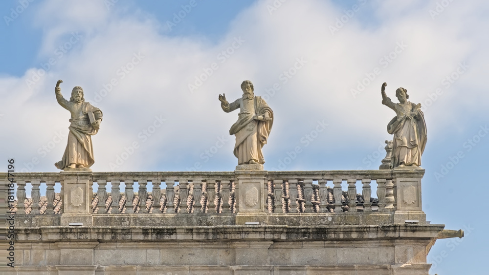 Obraz premium Sculptures on top of the roof of Sao Marco, old hospital in Braga, Portugal, now housing a hotel.