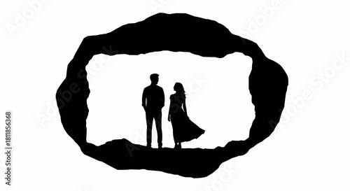 Silhouette of a couple standing inside a cave entrance.