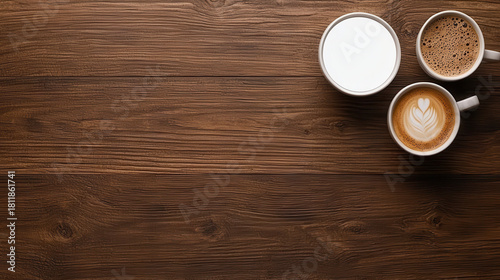 Warm coffee with soft foam beside pure milk shows calm latte cup on rich wood where cozy aroma lifts morning mood easing rising stress in daily routine