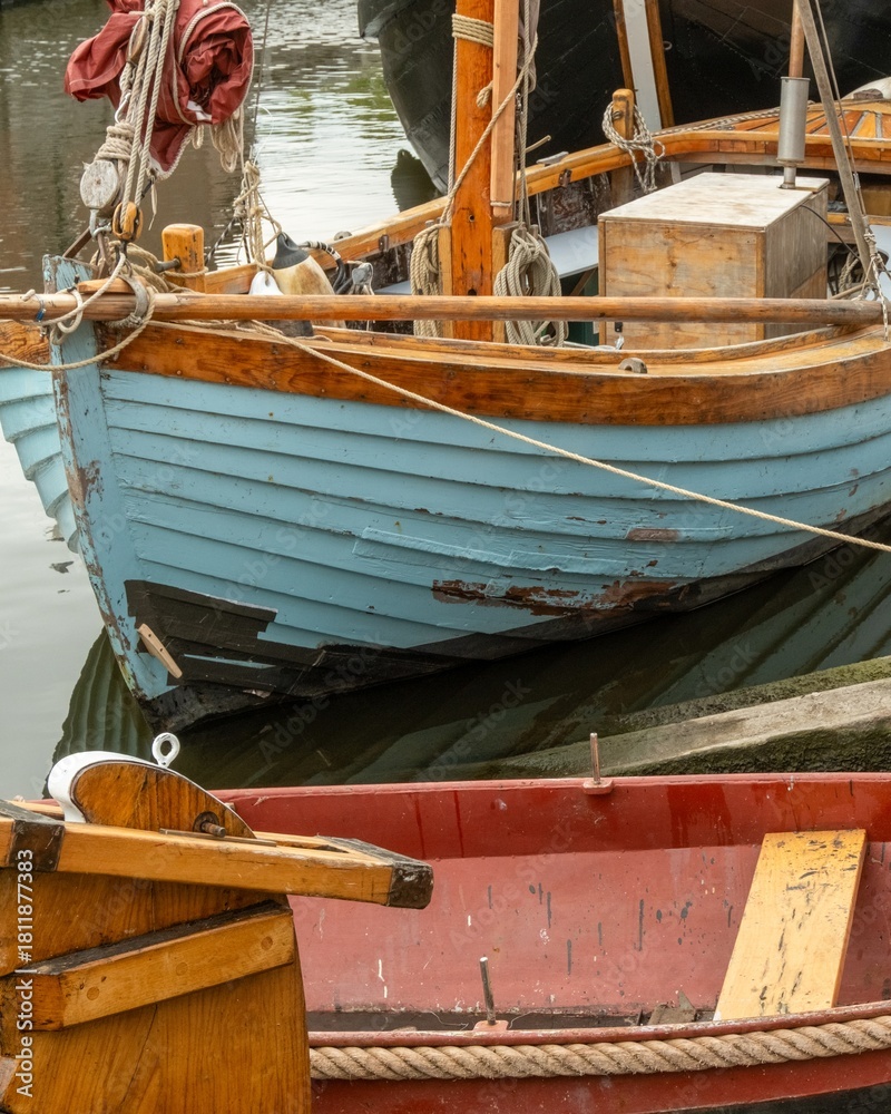 Fototapeta premium Old wooden boats moored at a rustic pier