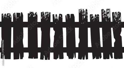 Weathered wooden fence with vertical slats forming a rugged silhouette and repeating pattern.