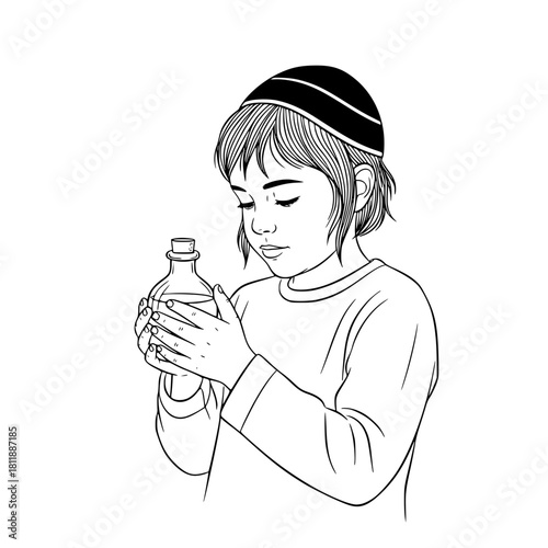 Boy wearing kippah holding Olive oil jar while looking down thoughtfully  