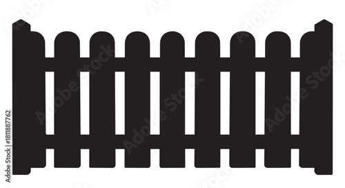 Silhouette of a decorative wooden picket fence forming a continuous boundary.