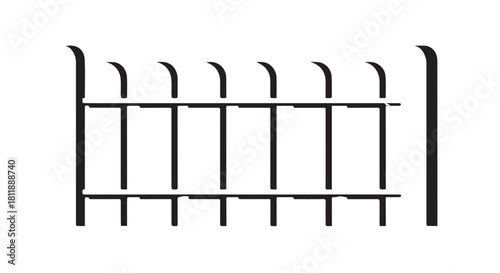 Simple black metal fence with vertical bars and curved top rails in an urban setting.