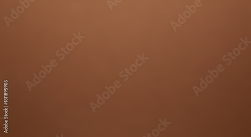 A plain brown textured background for various design projects and uses.