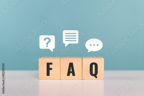 FAQ, frequently, asked, questions, topic. Wooden cubes with the word FAQ at the table. frequently asked questions on any topic and answers
