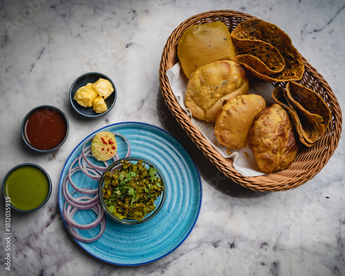 Poori basket with mirchi ke tipore - Rajasthani food (Indian cuisine)
