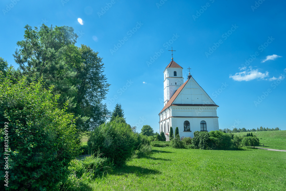 Fototapeta premium Transfiguration Cathedral a church in Zaslavl, Belarus. Architectural marvel Transfiguration Cathedral originally a Calvinist church in Belarus. Grand cathedral in Belarusian architectural heritage.