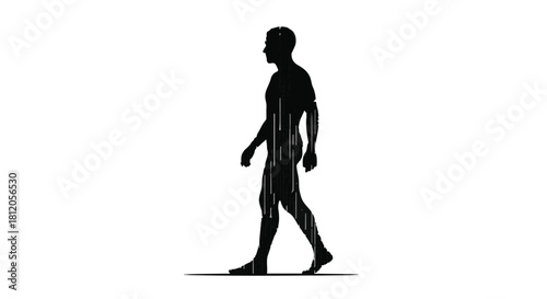 Silhouette of a man walking with digital data streams integrated into his form