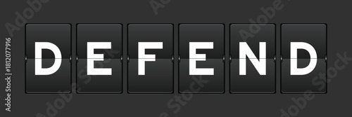 Black color analog flip board with word defend on gray background