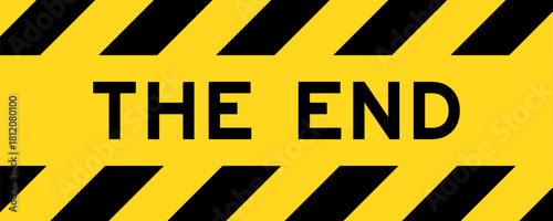 Yellow and black color with line striped label banner with word the end