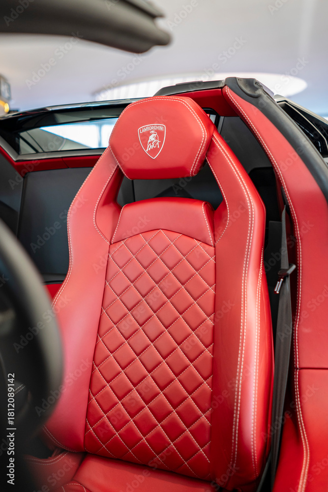 Obraz premium Silver Lamborghini Aventador S Roadster red leather seat with diamond stitching and headrest logo