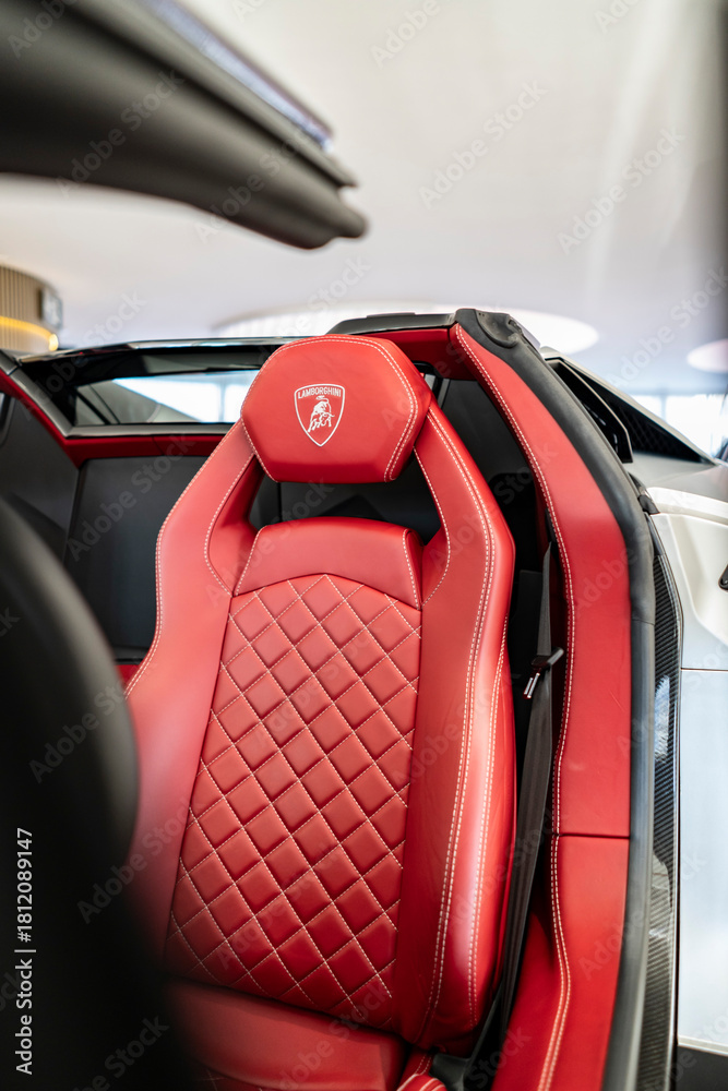 Obraz premium Silver Lamborghini Aventador S Roadster red leather seat with diamond stitching and headrest logo