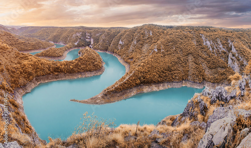 Tableau sur toile Uvac River forming breathtaking turquoise meanders, winding through a deep canyo