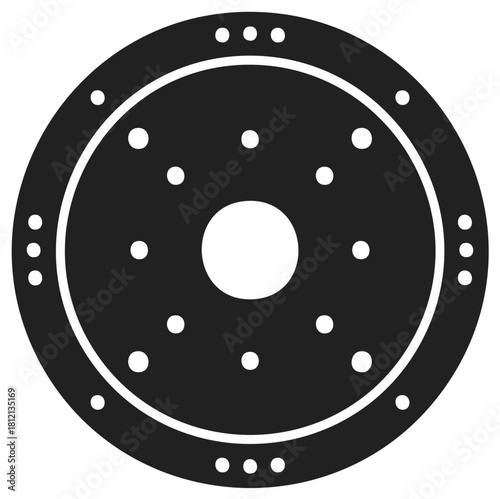 Circular object with a central hole and scattered dots