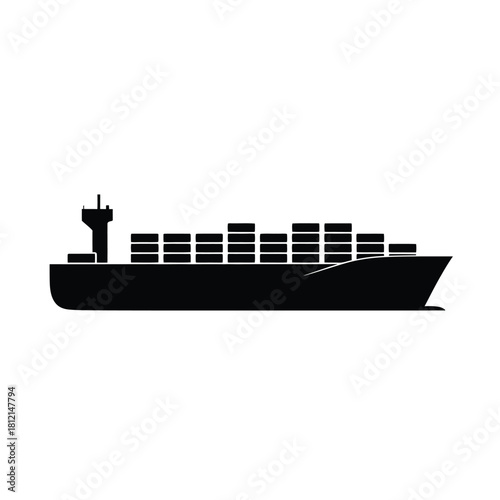 Silhouette of a large cargo ship carrying many containers