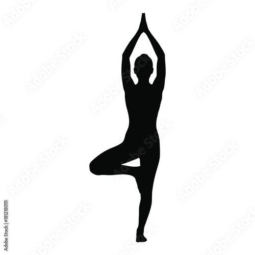 Silhouette of a person performing the tree yoga pose in a balanced position isolated on