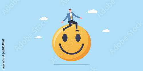 Man riding a giant smiley face in the sky