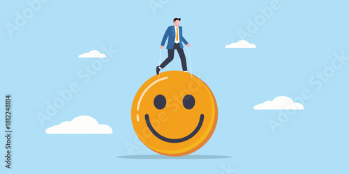 Man balances on giant smiley face in the sky