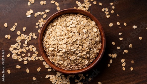 overhead shot of rolled oats in bowl rustic composition oatmeal texture food photography healthy breakfast oatmeal rolled oats