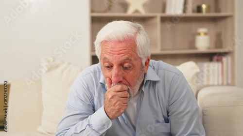 Wallpaper Mural Healthcare medicine. Senior man with high fever symptoms illness cold seasonal influenza covering mouth with his hand coughing. Elderly man with seasonal infections flu suffering from disease pain Torontodigital.ca