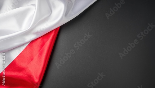 Polish flag on a gray background, copy space. Independence Day November 11, Poland.