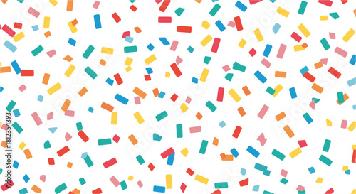 Smiling young woman stands outdoors with colorful umbrella on a bright day