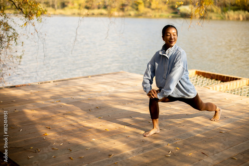 Korean woman practicing yog...