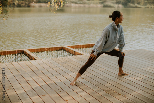 Korean woman practicing yog...