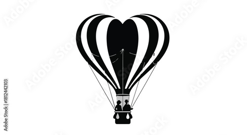 Silhouetted couple in a heart-shaped hot air balloon soaring through the sky