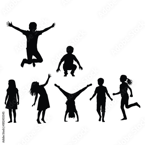 Silhouettes of joyful children playing and enjoying outdoor activities together