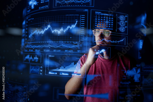 Man look at the dashboard with graphs and charts. Concept of data management system, business intelligence, data statistics, marketing analysis, key performance indicators (KPI) and analytics.