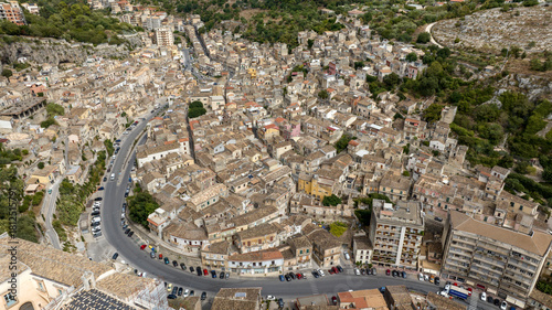 Fototapeta Naklejka Na Ścianę i Meble -  Aerial view of a neighborhood in the lower part of Modica. Modica is a small Italian town located in the hills of the province of Ragusa, Sicily, Italy.