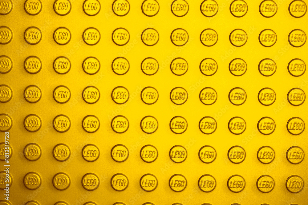 Naklejka premium Lviv, Ukraine - November 16, 2025: LEGO Brick Surface Texture Background