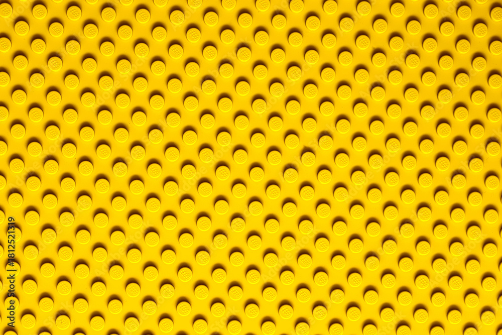 Naklejka premium Lviv, Ukraine - November 16, 2025: LEGO Brick Surface Texture Background