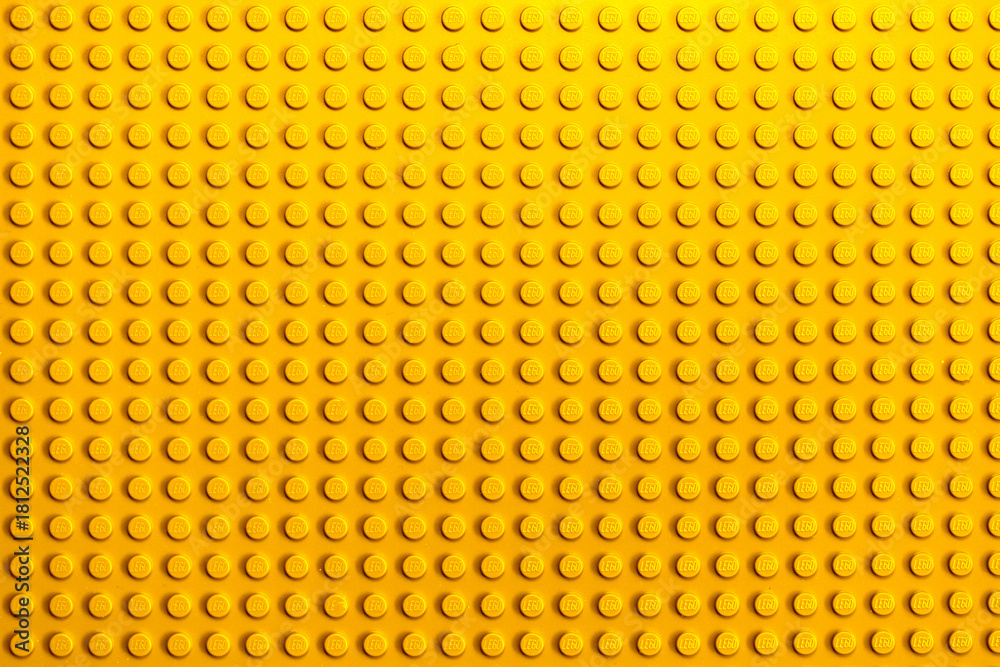 Naklejka premium Lviv, Ukraine - November 16, 2025: LEGO Brick Surface Texture Background