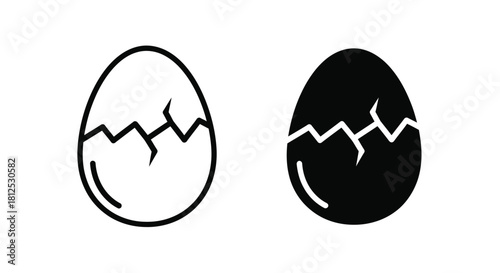 Two egg icons one white with cracks and one black side by side