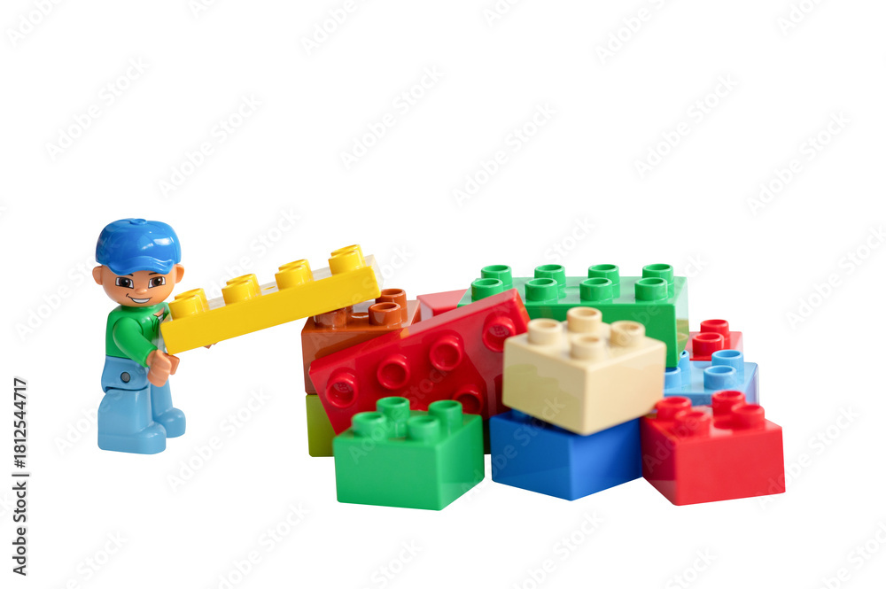 Naklejka premium A studio shot of Lego minifigure. Lego is extremely popular worldwide with children and collectors.